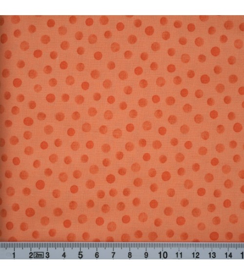 Tissu coton avec pois orange sur fond orange clair