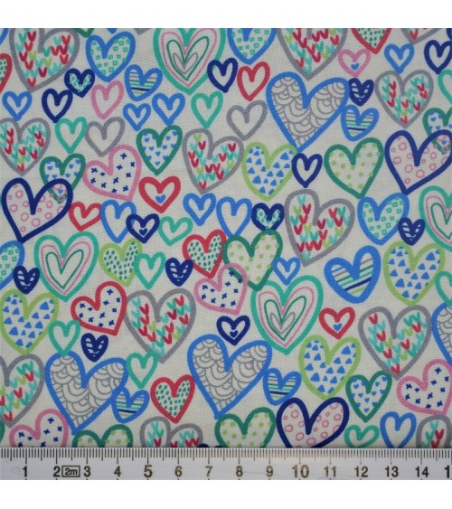 Tissu coton avec coeurs multicolors sur fond blanc
