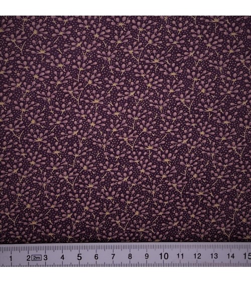 Tissu coton avec petits grains ocres sur violet foncé