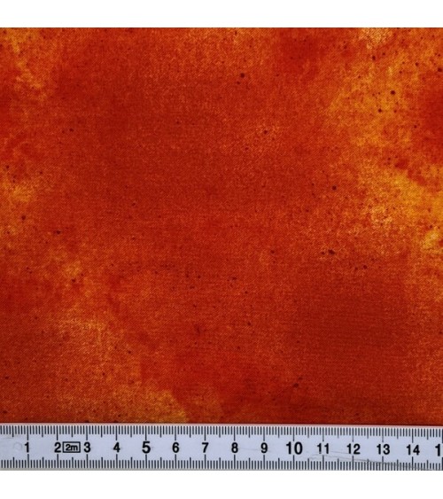Tissu coton effet marbré orange avec mouchetés bruns