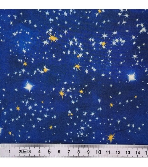 Tissu coton avec ciel étoilé sur fond nuancé bleu