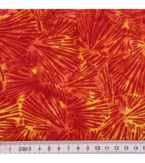 Tissu batik avec feuilles oranges et jaunes