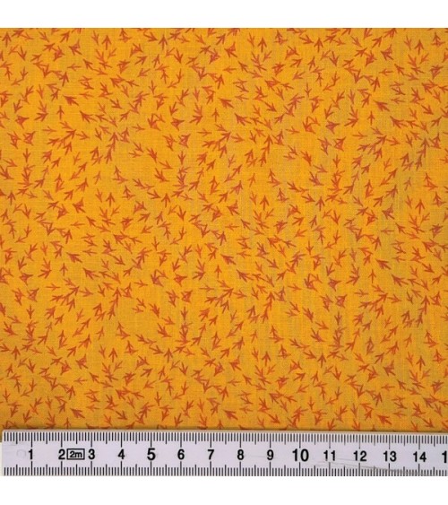 Tissu coton avec pattes de poules orange
