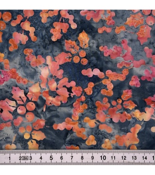 Tissu batik avec feuilles et grains rose et orange